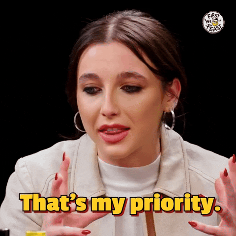 firstwefeast hot ones emma chamberlain goes for the glory while eating spicy