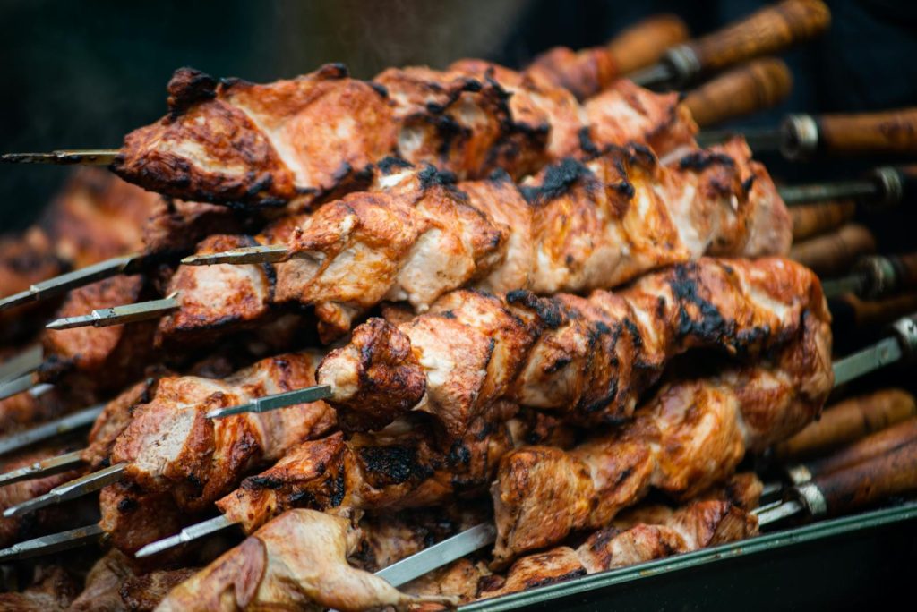 Young Sampaguita Vendor Confronted by Mall Security, Rosmar Tan Reaches Out to Help 6 Juicy grilled shashlik skewers stacked outdoors, showcasing vibrant barbeque textures in Moldova.