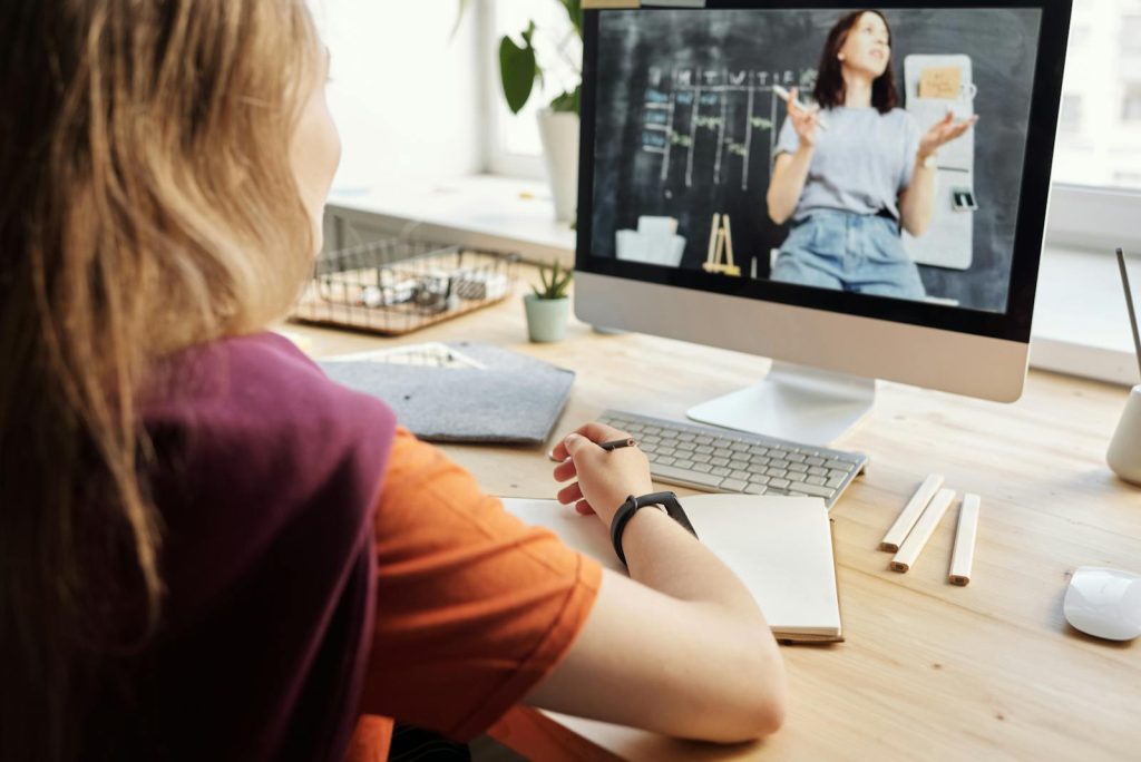 Get Rid of Boring Lessons, Try This 12 Classroom Management Tips for Lower School Learners in the Digital Age 8 Young student engaged in online class, using computer at home learning environment.