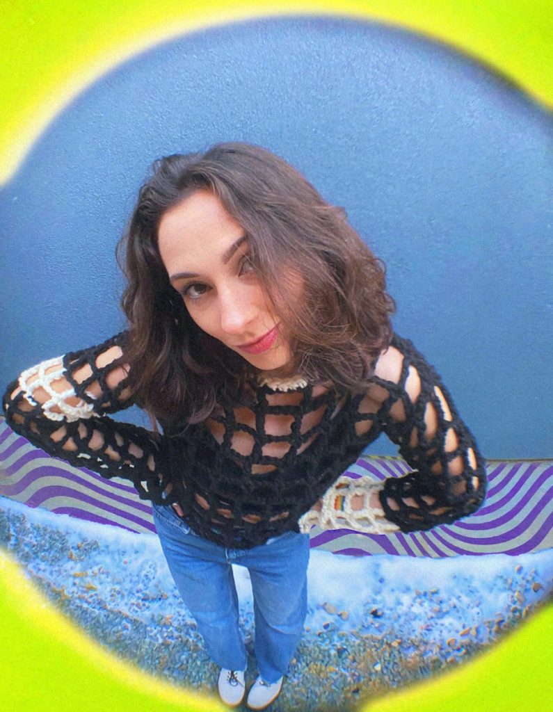 7-Point Checklist to Create Feature Articles that Goes Viral on Social Media in 7 Minutes 6 a woman standing in front of a blue wall