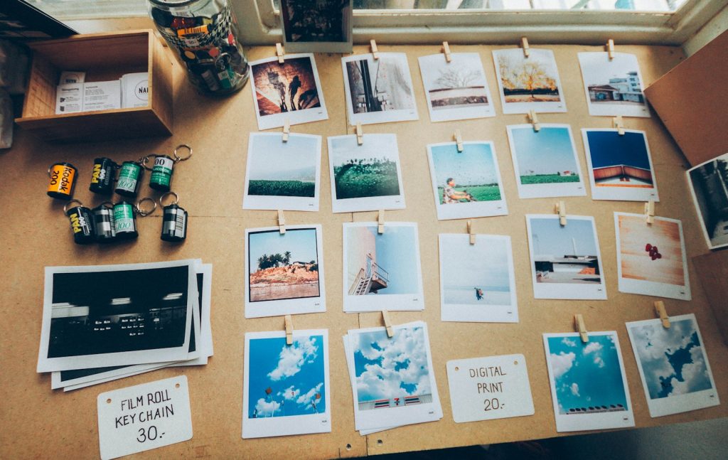 How to Create an Effective and Striking Photo Essay in Photojournalism 8 assorted photos on beige wooden table