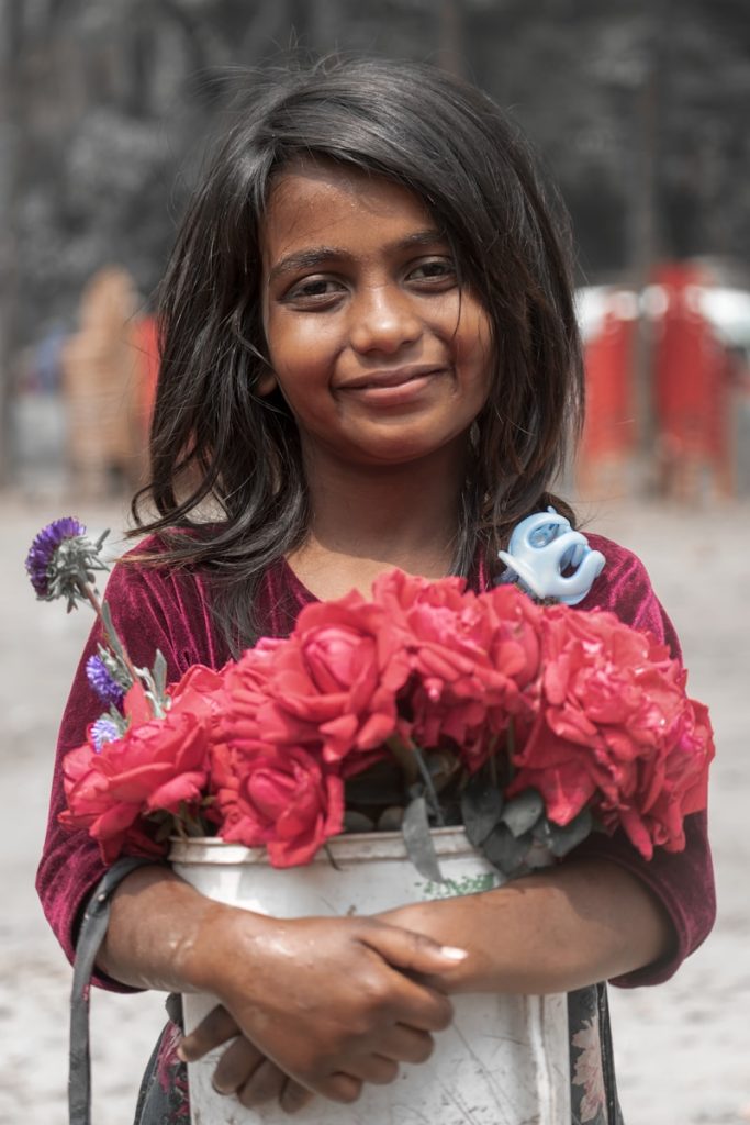 10 Greatest Hacks to Write Timeless Feature Articles; Guaranteed for Human Interest, Evergreen Topics 7 woman in red floral dress holding pink flower bouquet