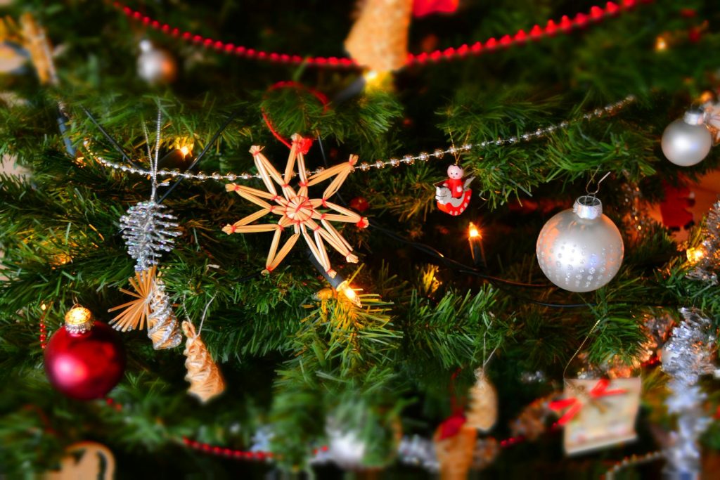 DepEd Reiterates 5 Unique Filipino Christmas Traditions - May tatalo pa ba sa Pasko ng Pinas? 5 Close-up of a decorated Christmas tree with lights and ornaments, showcasing holiday spirit.