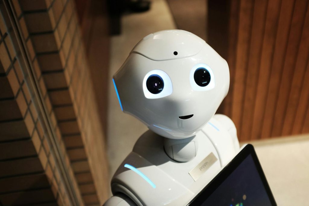 Can PH Keep Pace? The Concerning Rise of AI and Issue of Possible Massive Job Layoffs 6 A futuristic humanoid robot in an indoor Tokyo setting, showcasing modern technology.