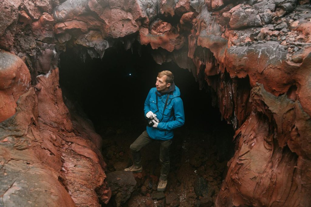 Top 10 Insanely High-Paying Careers in the Philippines - For Your Career Guidance 9 Adventure seeker explores deep cave with intriguing geological formations.
