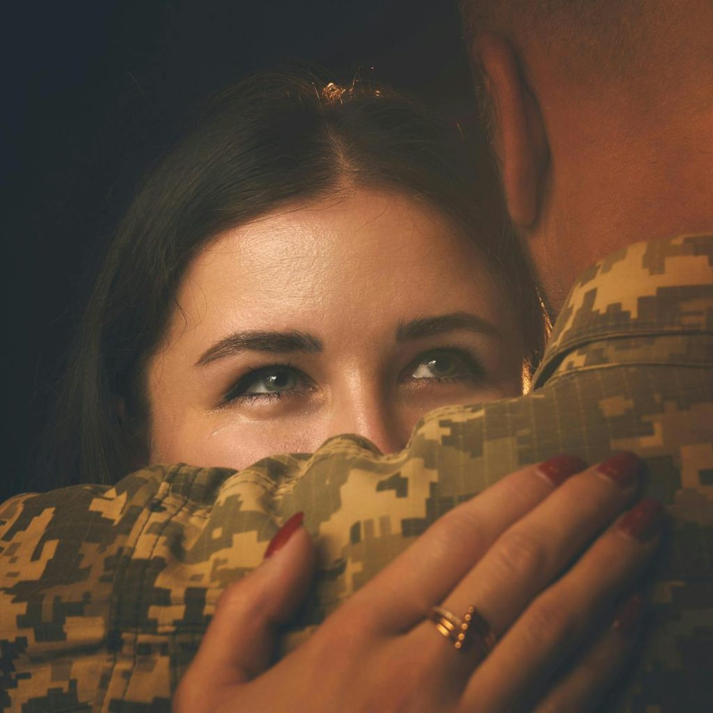 He Adhered to His Parent's Advice Not to Emulate Them: PMMA Valedictorian Grows Up in Squatter Area 5 Heartfelt embrace between a couple, highlighting the bond and emotions of a military reunion.