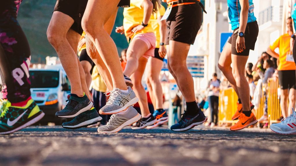 How Physical Exercise and Memory Workouts Boost Memory, Concentration According to Science 5 Group of runners participating in a city marathon during daylight.